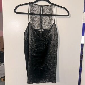 Woman’s velvety soft lace back tank top. By Naïf, size S in black.